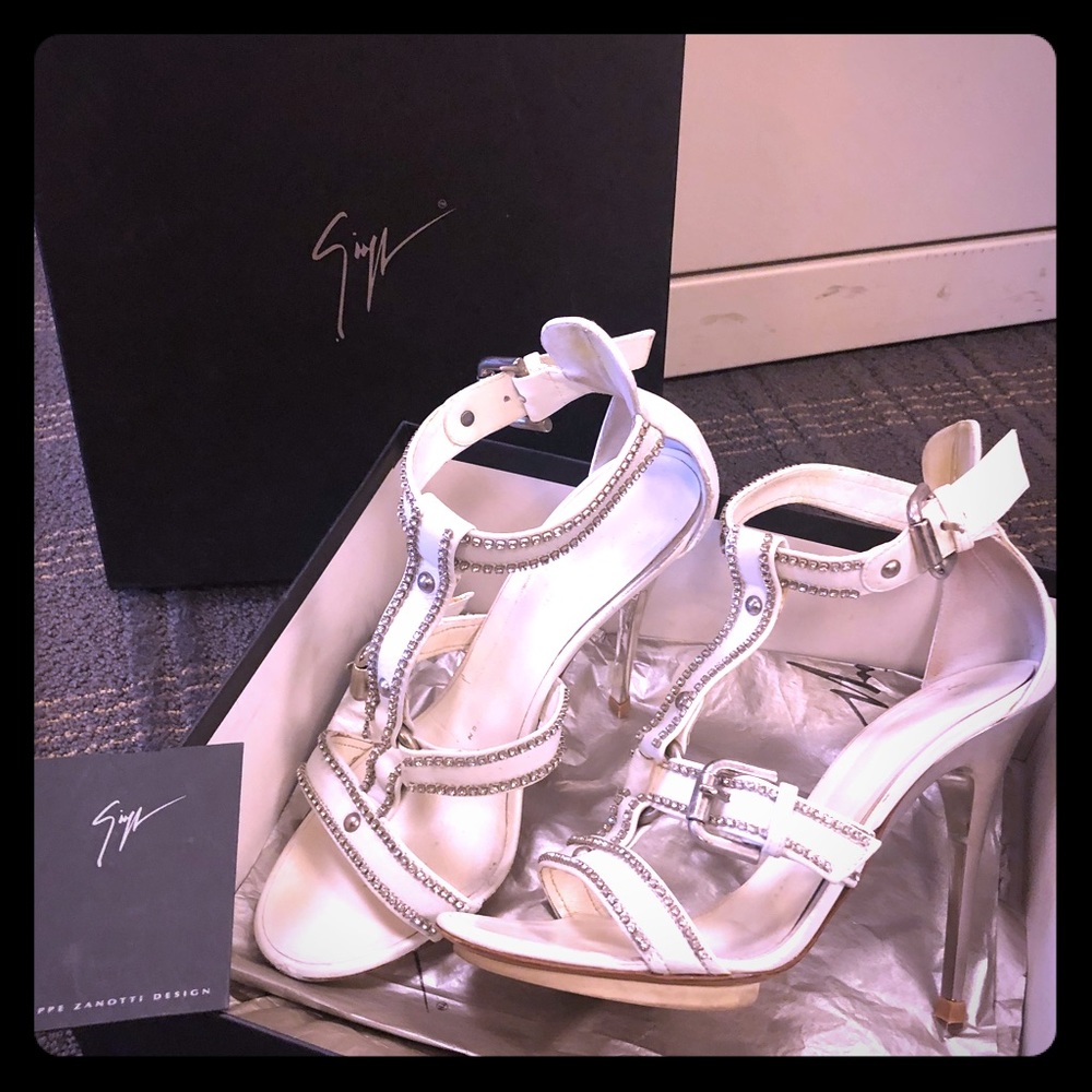 Giuseppe white heels.